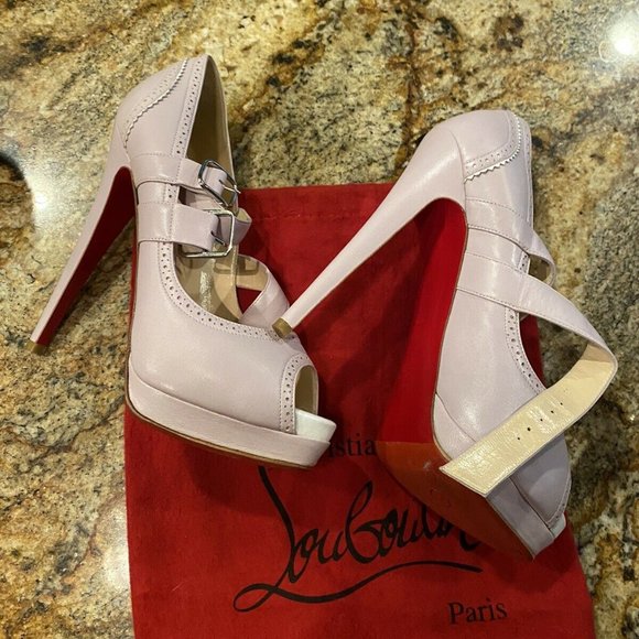 Christian Louboutin - Picture 1 of 3